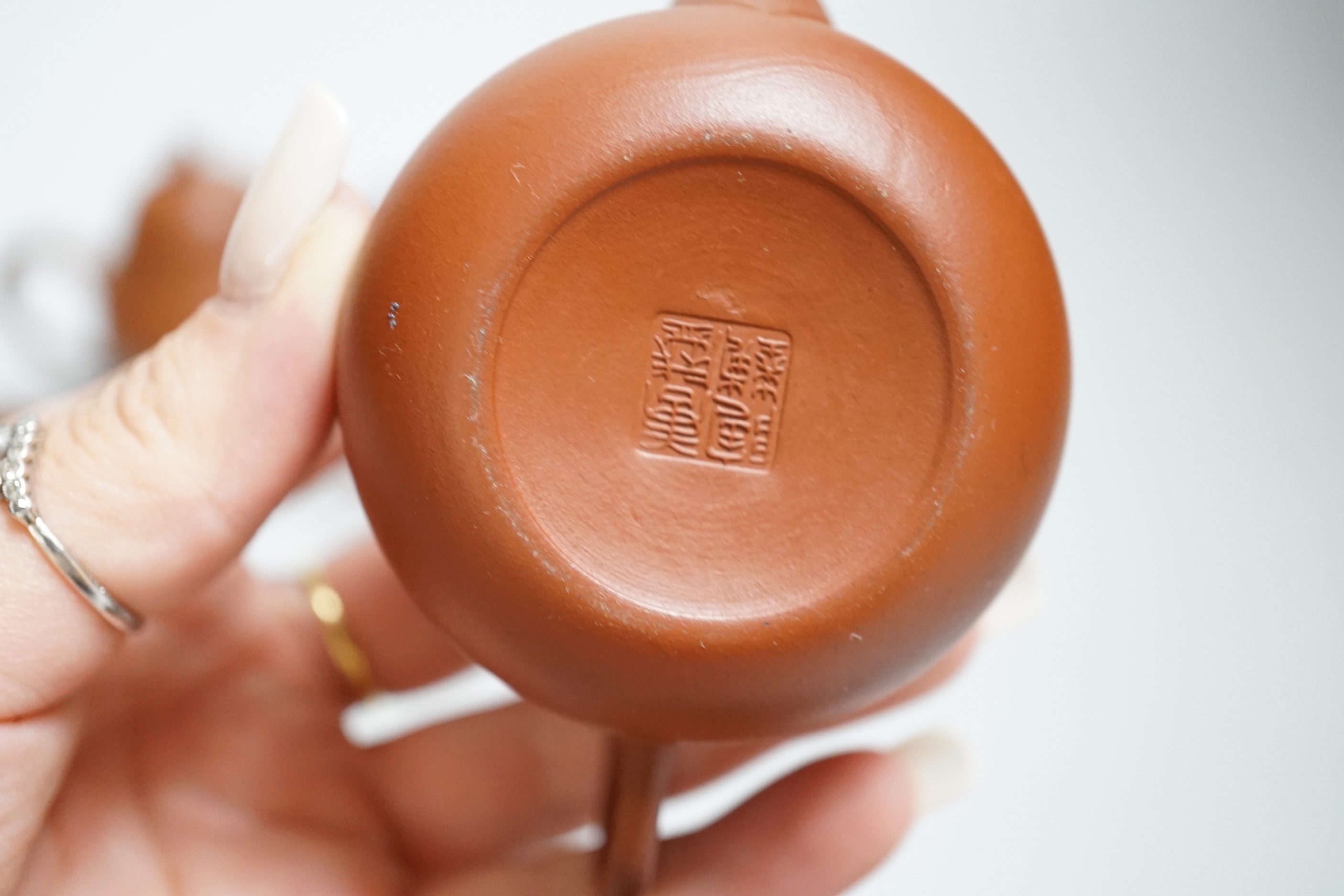 Five Chinese Yixing small teapots, probably 19th/20th century, one cover lacking
